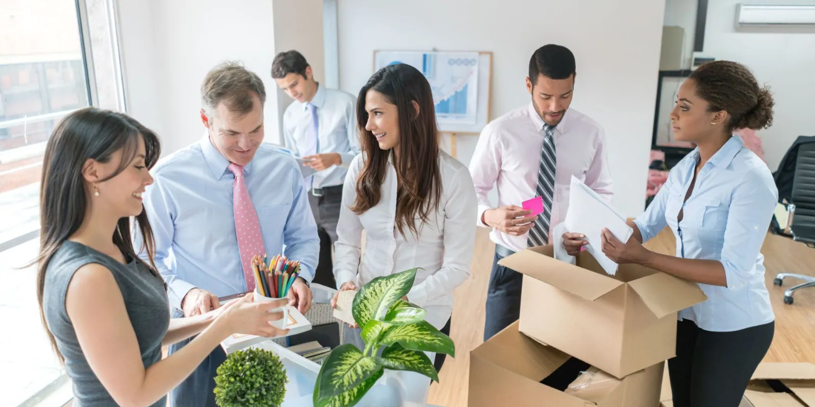 Colleagues discussing office move plans